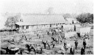 Brunson’s Stage and Freighter at Keystone House, 1898. Mr. and Mrs. Horatio Brunson at right foreground.