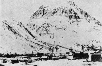 LUNDY IN WINTER, MOUNT SCOWDEN RISES IN THE BACKGROUND
