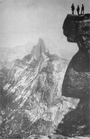 Half Dome and Clouds’ Rest, from Glacier Point. Men standing on a precipice of 3,257 feet