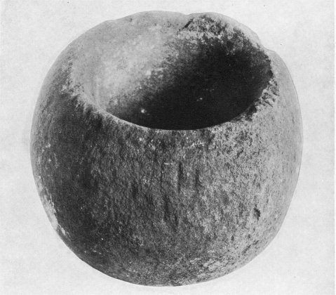 Globose stone mortar.