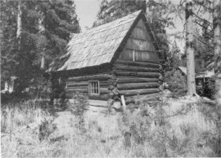 Illustration 27. Anderson cabin after relocation at Yosemite Pioneer History Center. Photo by Gary Higgins, 1984