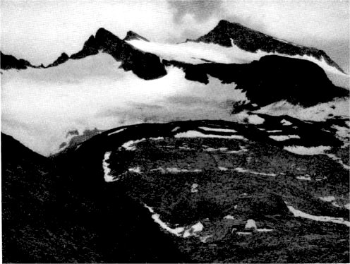 On Mount Lyell still remain remnants of ancient glaciers which once swept down into the canyons of Yosemite, reshaping the mountains as they moved. By Ansel Adams