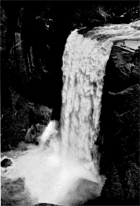 Vernal Falls is remarkable for its symmetry and volume of water and for the rainbow mists which foam at its feet. By Ansel Adams